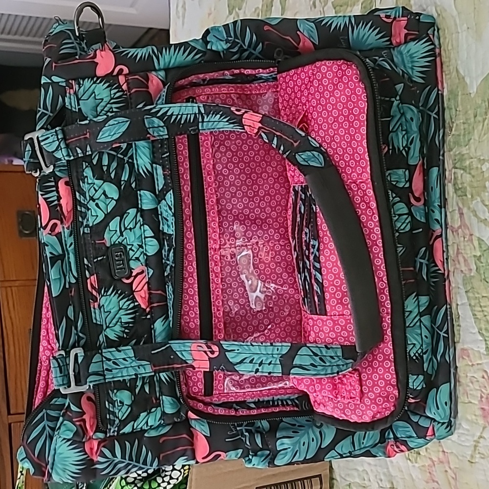 Lug Convertible RFID Tote Ace 2. Back pack or shoulder straps. Full zip close.